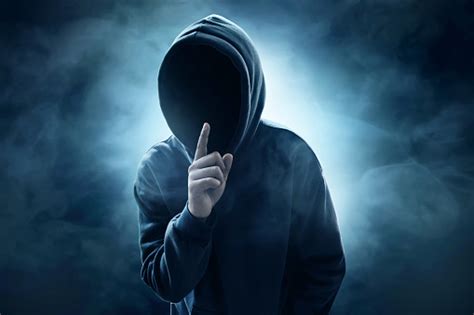 Once you make this discovery, don't fret because getting rid of hackers and the malicious. Hooded Computer Hacker Stock Photo - Download Image Now ...