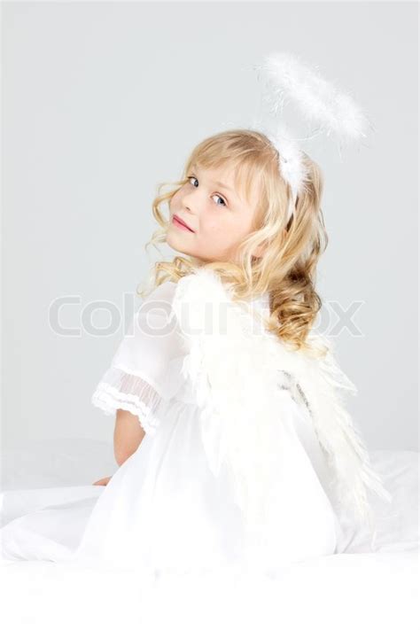 Studio Shot Of Little Girl As An Angel Stock Image Colourbox
