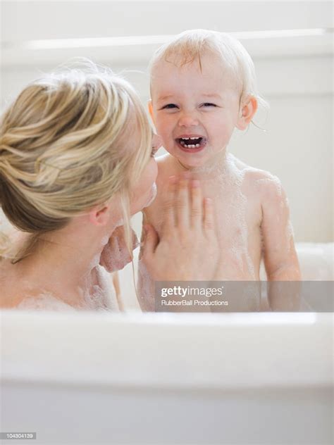 Mother And Baby Taking A Bubble Bath Photo Getty Images