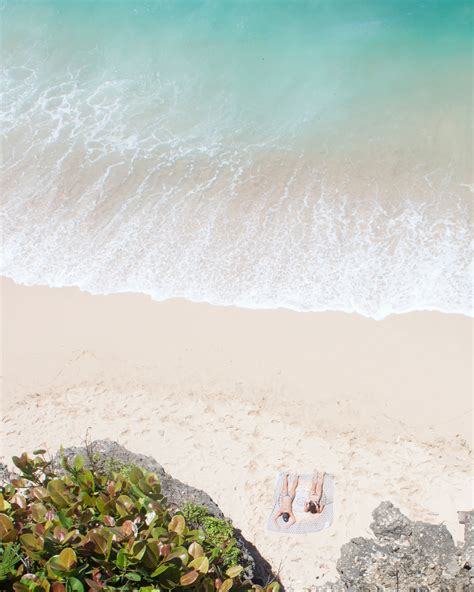 Photo Of People Sunbathing On Beach · Free Stock Photo