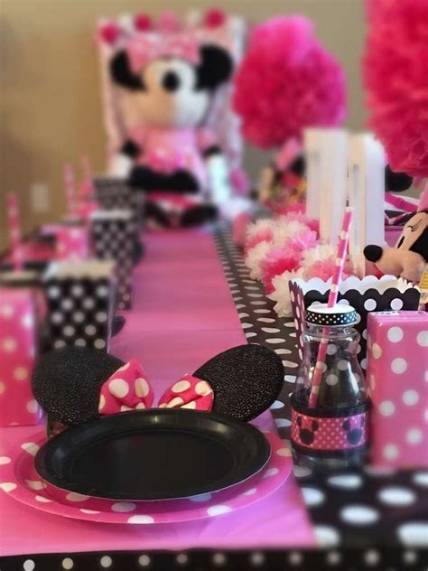 Diy how to make a minnie mouse balloon column decoration. Check out the table settings at this adorable Twodles ...