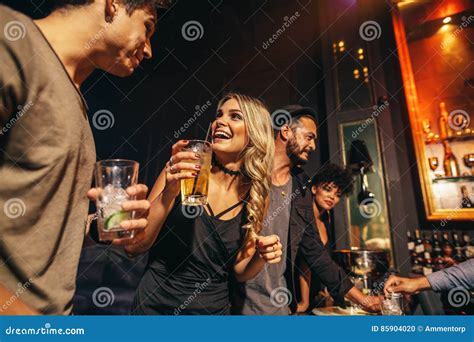 Group Of People Having Fun At Nightclub Stock Photo Image Of Party