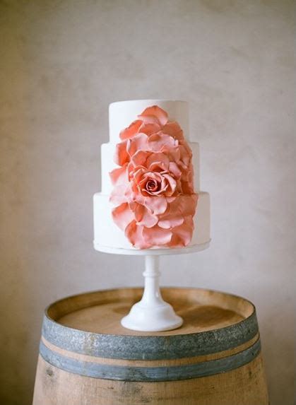 White Wedding Cake With Coral Flower A Wedding Cake Blog