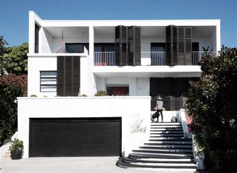 Black And White House With Two Amazing Terraces - DigsDigs