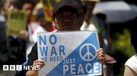 Japan Military Legislation Changes Draw Protests Bbc News