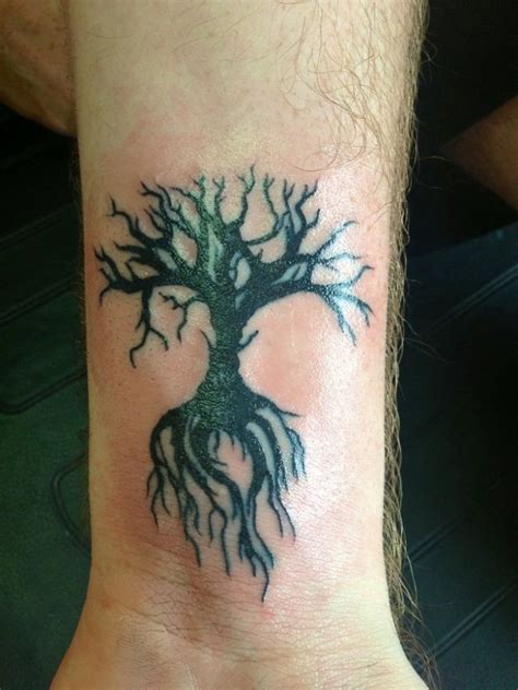 Attractive Tree Wrist Tattoos Design