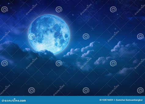 Beautiful Blue Moon Behind Cloudy On Sky And Star At Night Outdoors At