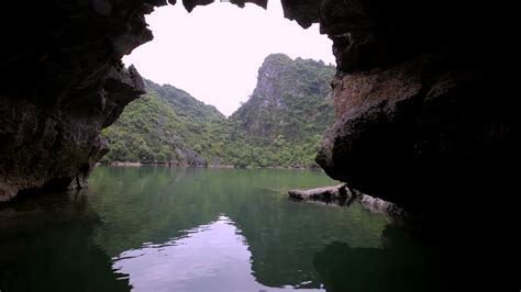 Ws Kayaking Through Limestone Cave In Ha Long Bay Vietnam Stock Video