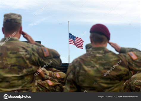 American Soldiers Saluting Us Flag Us Army Stock Photo By ©bumble Dee