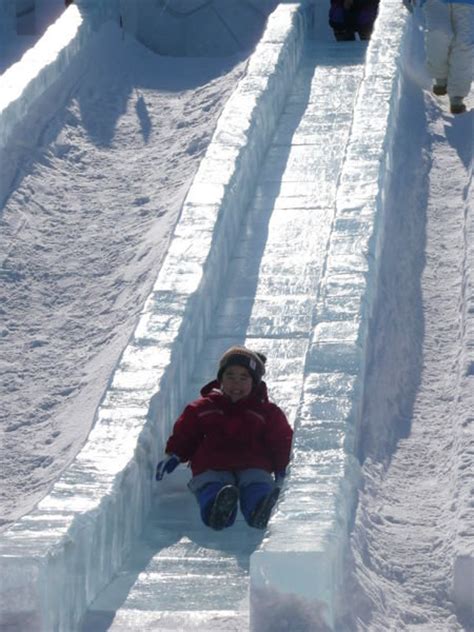 Cute Kiddy On An Ice Slide Photo