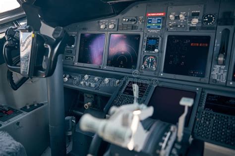 Aircraft Flight Deck With Control Column And Flight Displays Stock