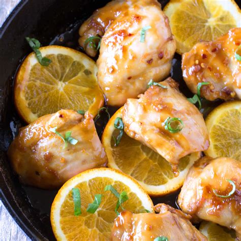 Recipes in an easy to follow gif format! Skillet Orange Chicken Thighs - thestayathomechef.com