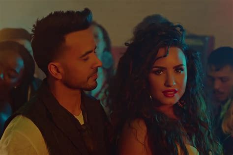 Tengo en esta historia algo que confesar ya entendí muy bien que fue lo que pasó y aunque duela tanto, tengo que aceptar que tu no eres la mala, que el malo soy yo. Demi Lovato and Luis Fonsi Team Up in 'Echame La Culpa' Video