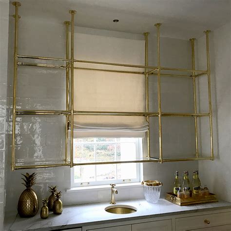 A variety of items from vintage teacup soy candles and broken. 1121 Edge Style Shelving - sinklegs
