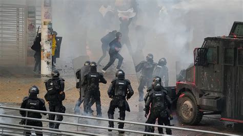 Colombian Protestors Clash With Police While Staging Demonstration On One Year Anniversary Of