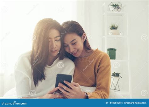 Beautiful Young Asian Women Lgbt Lesbian Happy Couple Sitting On Bed