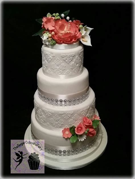An Ivory And Coral Damask Wedding Cake Decorated Cake Cakesdecor