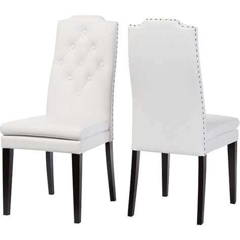 Well you're in luck, because here they come. Dylin Faux Leather Nailheads Dining Chair - Button Tufted ...