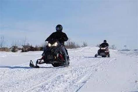 3 Snowmobilers Rescued After Their Snowmobiles Get Stuck In Deep Snow