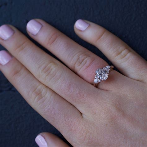 (setting price) * exclusions apply. Oval Diamond Side Stone Cluster Ring Engagement Ring ...