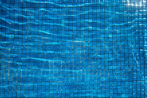Water In The Swimming Pool With Blue Tiles Del Colaborador De Stocksy