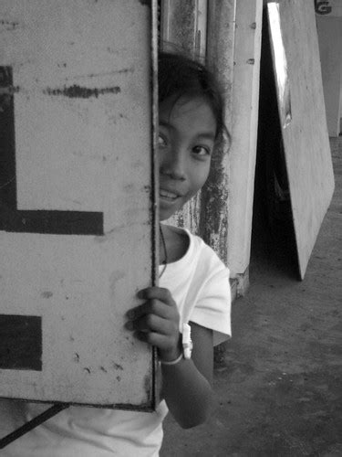 a shy filipina girl sneaking a peek at me antefixus21 flickr