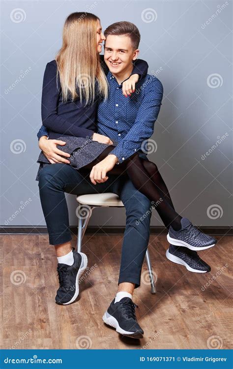 A Nice Young Woman Is Sitting On Her Boys Lap Stock Image Image Of