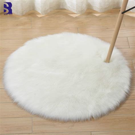 White round artificial sheepskin rug