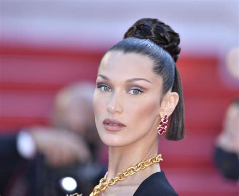 must see bella hadid covers breasts in eye popping necklace at cannes