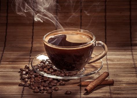 Premium Photo Steaming Cup Of Coffee