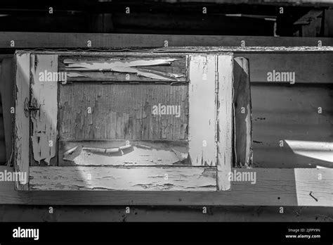 Paint Peeling Off The Wooden Window Of An Abandoned Sapphire Miners Hut