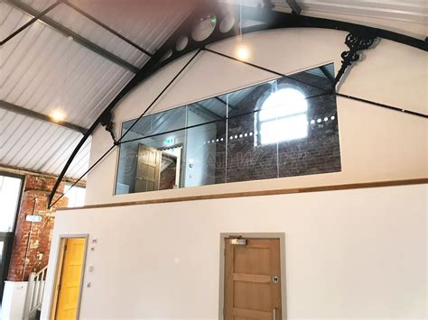 Inline Single Glazed Acoustic Glass Partition On A Mezzanine For Colburn Developments In Stroud