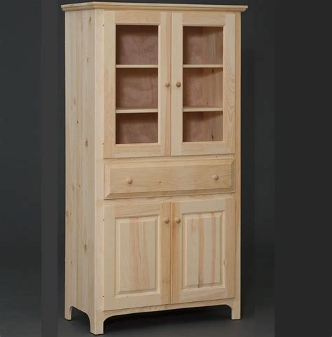 This flat panel all wood constructed pantry cabinet can be stained or painted to suit any kitchen design. Amish built 4 Door Pantry Cabinet | Cubby storage ...