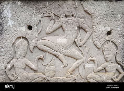 Bas Reliefs Of Dancing Apsaras Female Spirits At The Bayon Angkor