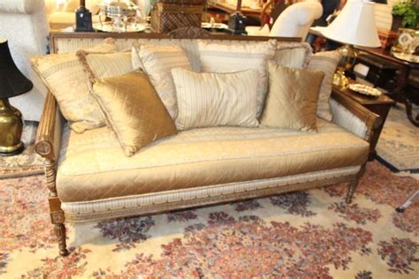 Maybe you would like to learn more about one of these? French style loveseat with wooden arms and trim and 9 ...