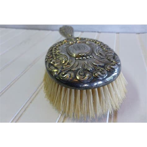 Some are plated in real silver with ornate designs; Antique Tiffany & Co. Gilded Sterling Silver Hair Brush ...