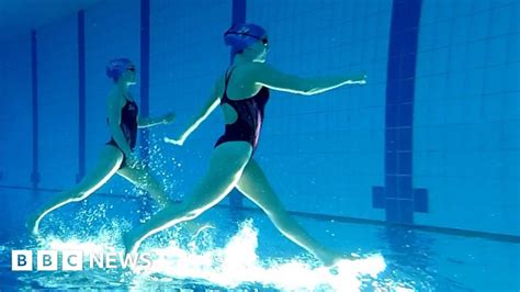 Synchronised Swimmers Dance In The Water Bbc News
