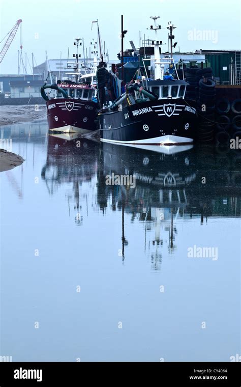 Fishing Boats At Quay In Old Leigh Stock Photo Alamy