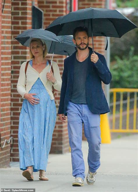 Claire Danes Shows Off Growing Baby Bump As She Enjoys A Rainy Walk