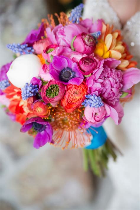 Pastels with hint of magenta scabiosa flower. Colorful Winter Wedding - Belle The Magazine