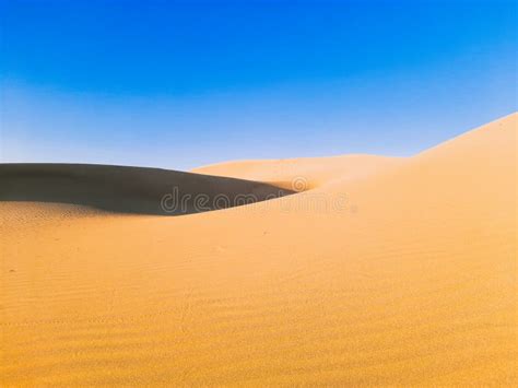 White Clouds In The Beautiful Blue Sky In Sahara Desert Stock Image