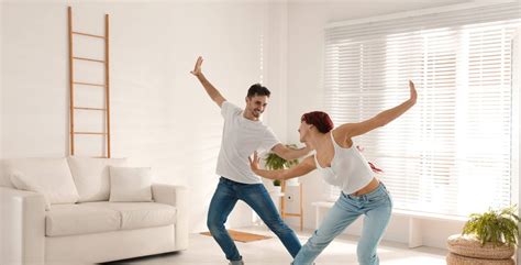 Beautiful Young Couple Dancing In Living Room Tectectec France
