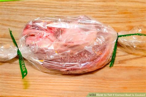 It should be greyish brown at that point, but you can still check it with a thermometer to be sure. 3 Ways to Tell if Corned Beef Is Cooked - wikiHow