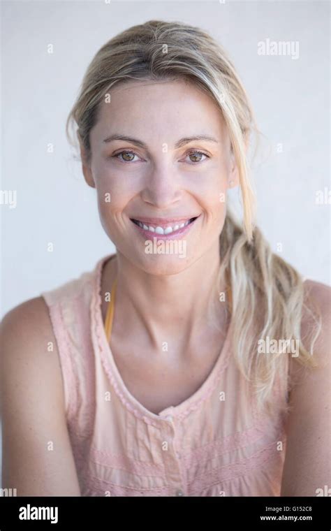 Close Up Of Smiling Blond Woman Stock Photo Alamy