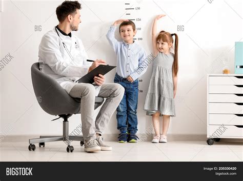 Male Doctor Measuring Image Photo Free Trial Bigstock