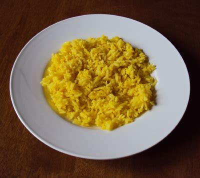 Add a pinch of salt to the pot and then 3 cups of water. Yellow Rice Recipe - Melanie Cooks