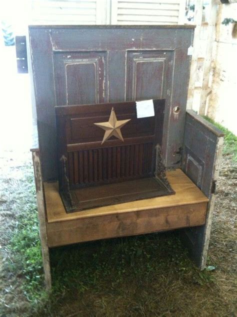 An Old Wooden Bench With A Star On It