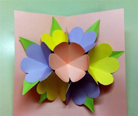 Fold a piece of card in half. Pop Up Mother's Day Card · How To Make A Pop Up Card ...