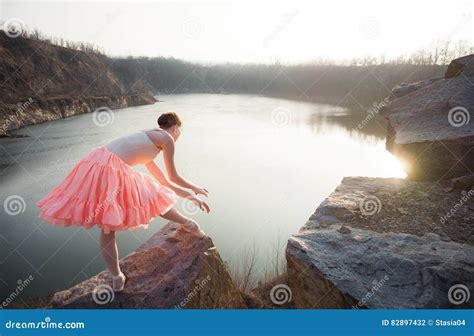 Ballerina In Ballet Pose Above The Lake Stock Photo Image Of Pointe