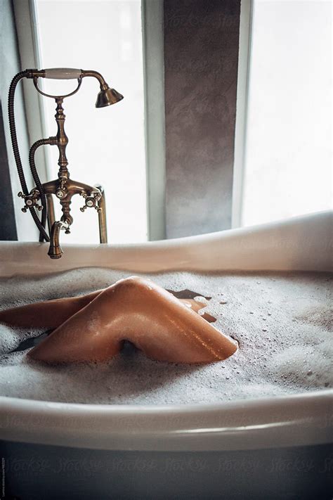 Legs Of A Woman Lying In The Bathtub By Stocksy Contributor Lumina Bath Modern Farmhouse